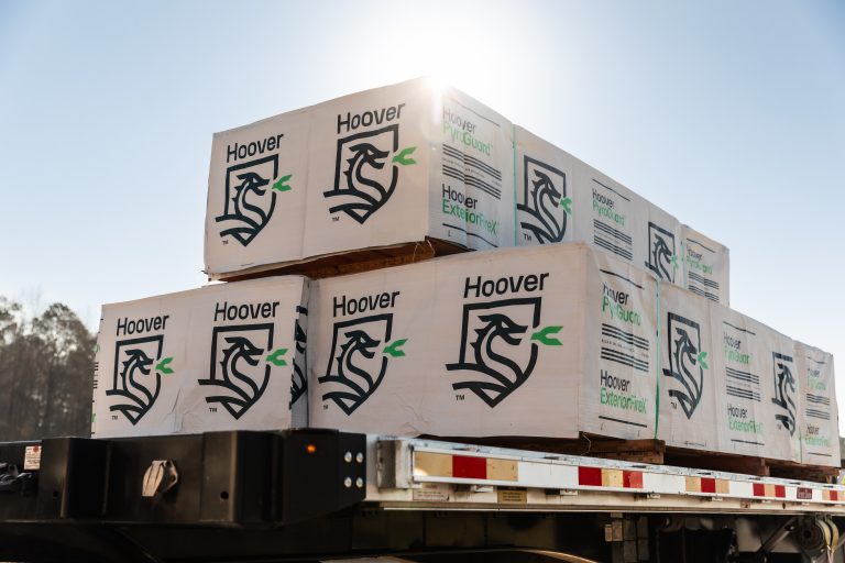 Hoover fire-retardant-treated wood products, including PyroGuard™ and ExteriorFireX™, loaded onto a truck for delivery to Boise Cascade.